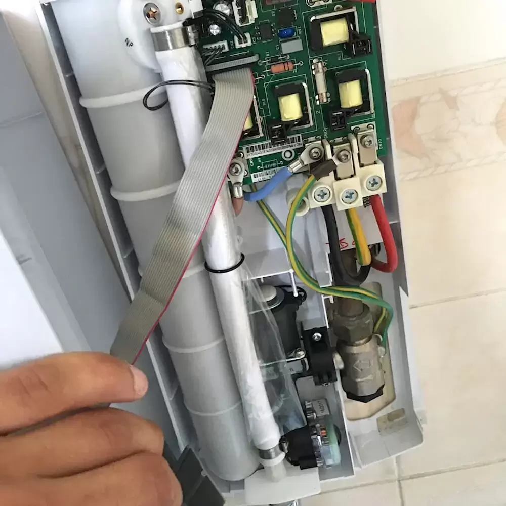 Testing of electric shower circuit with cover removed